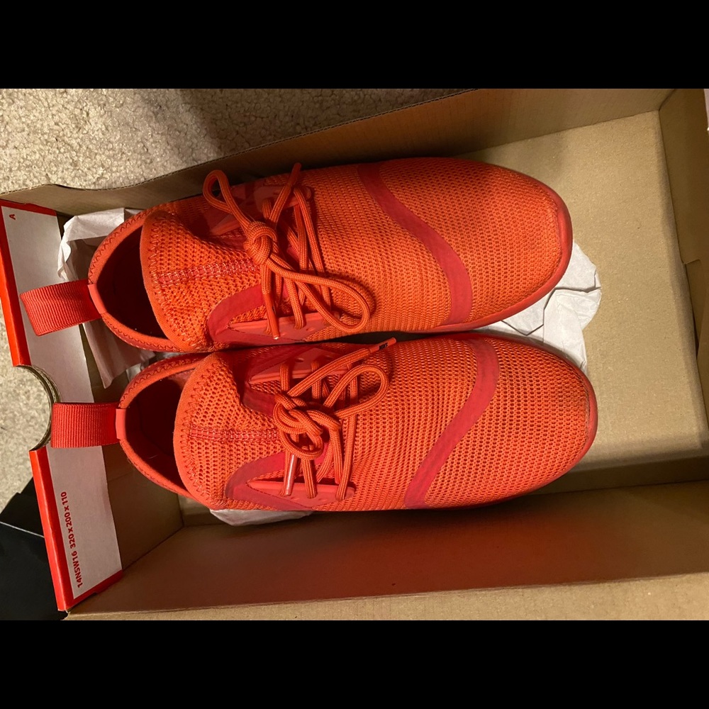 Red Nike, great for running. Size 8
